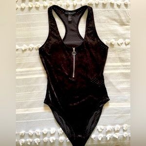 Velvety body suit never worn